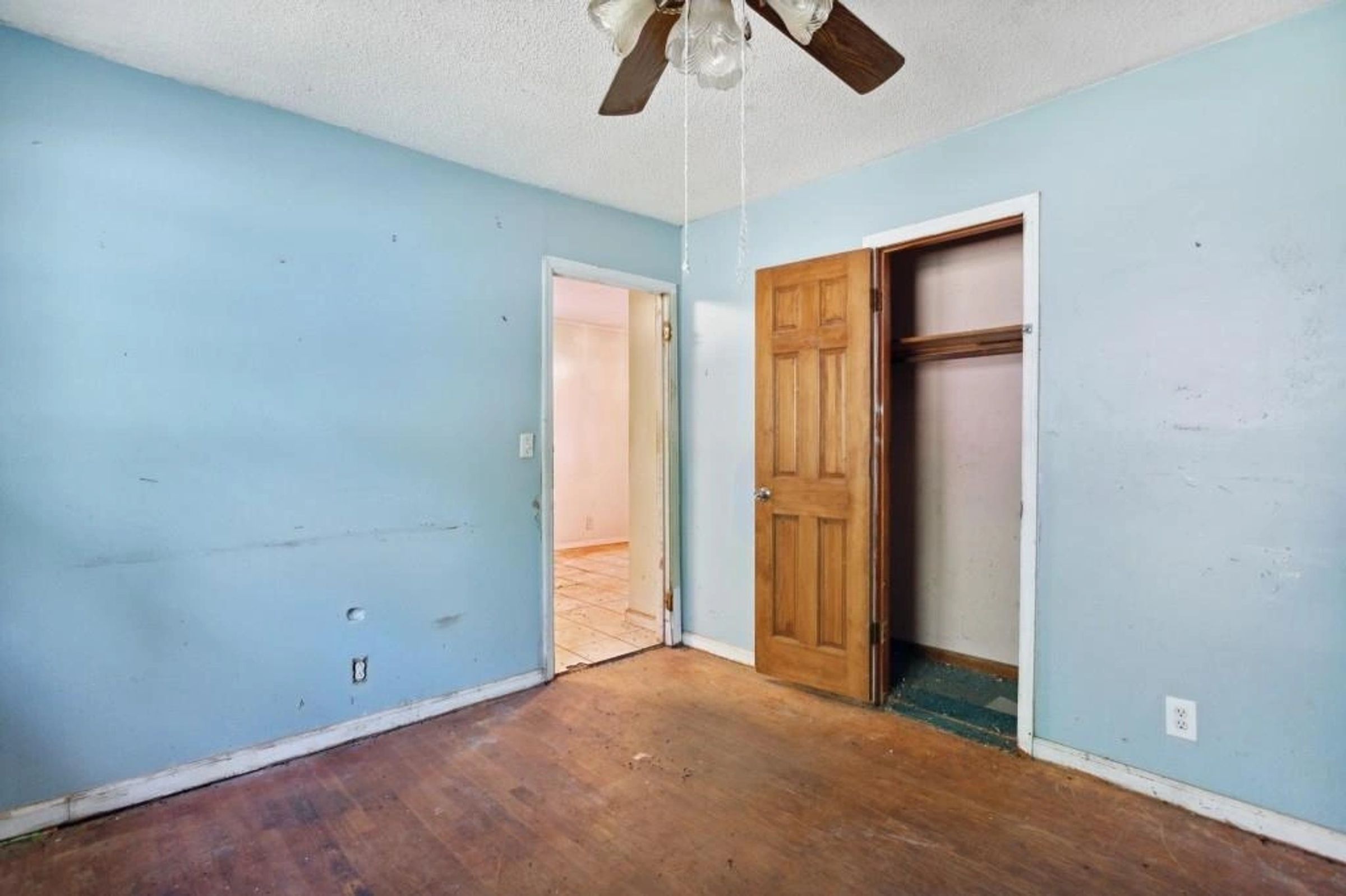 Original bedroom with closet before renovation